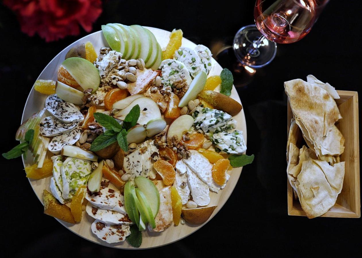 Country Spa Retreat Snagov Exterior photo A cheese platter with a selection of cheeses and fruit